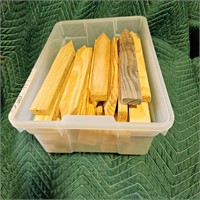 Tote of wooden stakes