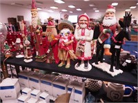 Nine figurines, all Santa-related from 4 1/2" to