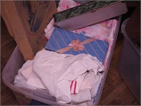 Container of vintage children's clothes, infant
