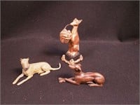 Three Russian wolfhound figurines, two are metal;