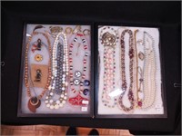 Two containers of costume jewelry: KJL,