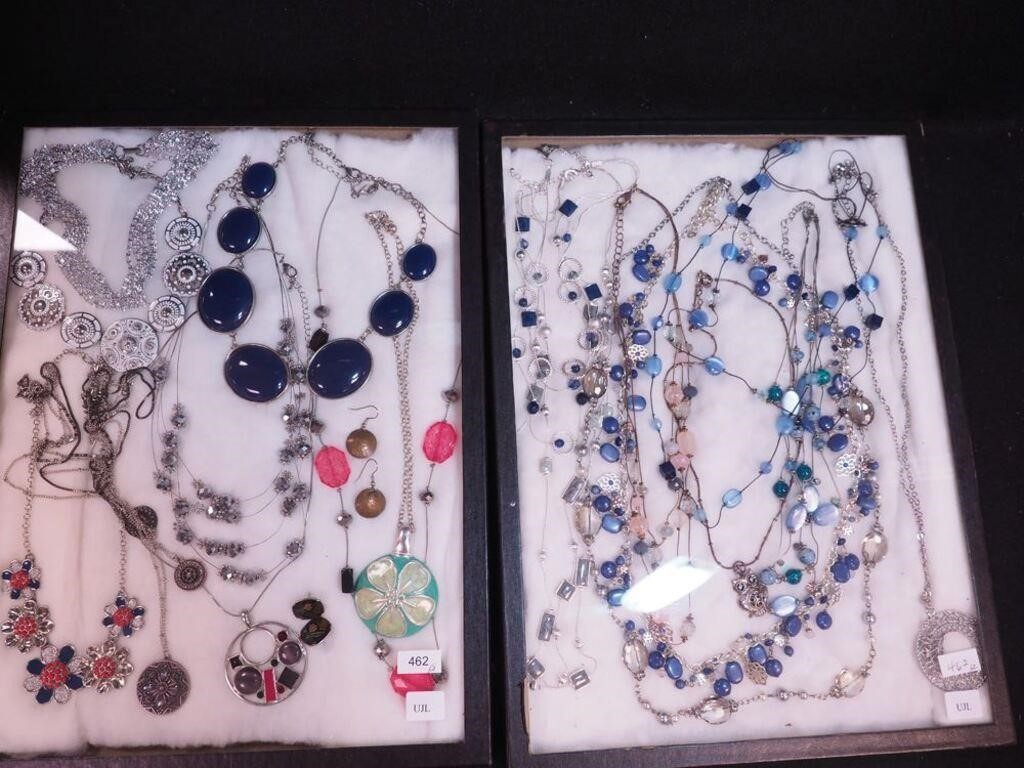 Two containers of mostly necklaces including