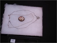 Sterling pin with carved shell cameo, 18" chain