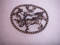 Unmarked pin featuring two horses pulling