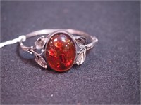 Unmarked silver bracelet with amber stone and