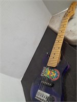 Harmony Guitar (knob broken and strings missing)