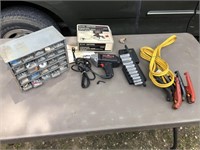 Drill, socket set, organizer and jumper cables