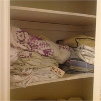 contents of 2nd shelf linens