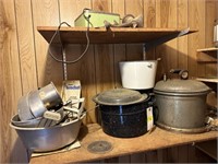 Pressure cooker and other pans on shelf