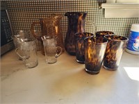 Art glass pitcher & 4 glasses, amber pitcher and