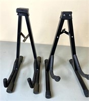 TWO FOLDING GUITAR STANDS