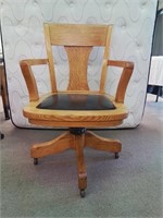 Oak chair with wheels