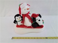 Singing snowman, puppy and penguin