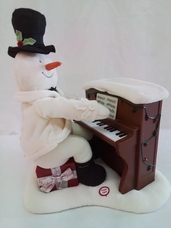 Snowman piano player