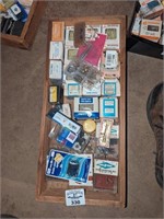 Wooden box of assorted hardware