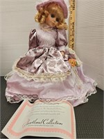 The Heartland Collection porcelain musical doll.