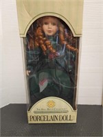 The doll house collection porcelain doll. 15in