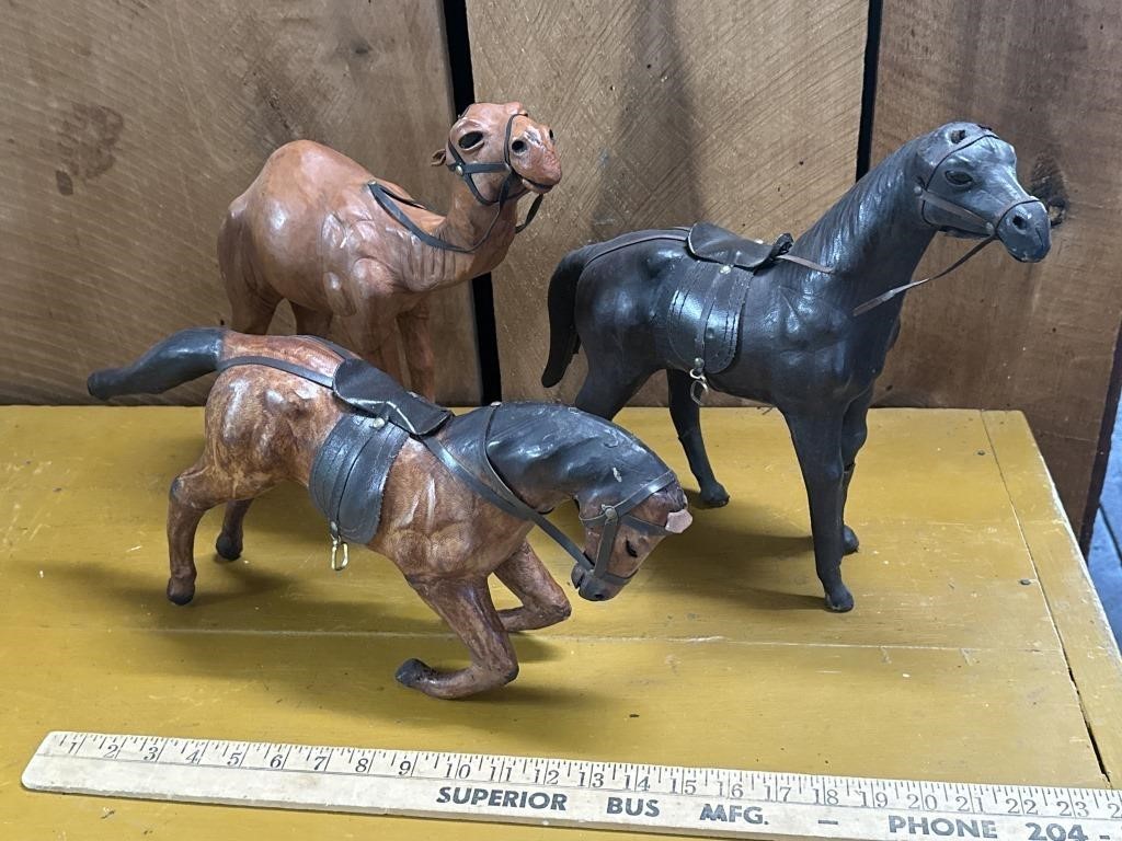 Leather wrapped camel and horses
