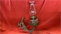 ANTIQUE OIL LAMP WITH BRASS WALL HOLDER