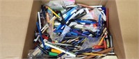 BOX FULL OF PENS AND OTHER WRITING