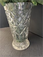 Cut glass vase with artificial flowers