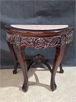 Wood carved side table w/ marble inset top
