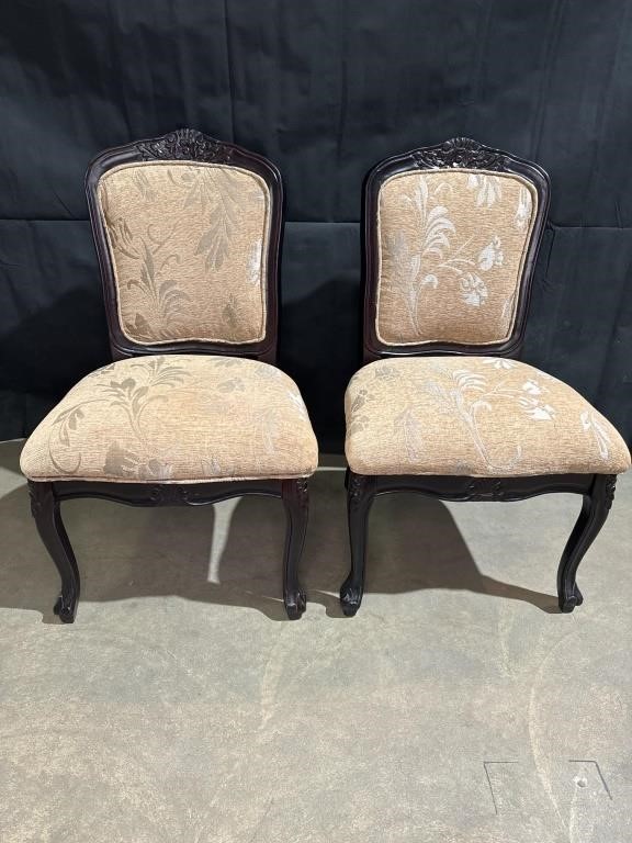 2 upholstered parlor chairs with wood carvings