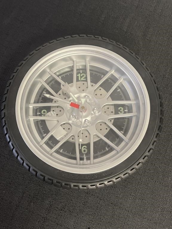 Sterling & Noble Tire clock, approx 10 1/2in