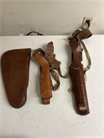 THREE LEATHER HOLSTERS