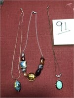 3 necklaces, 2 w/single piece & 1 w/ several