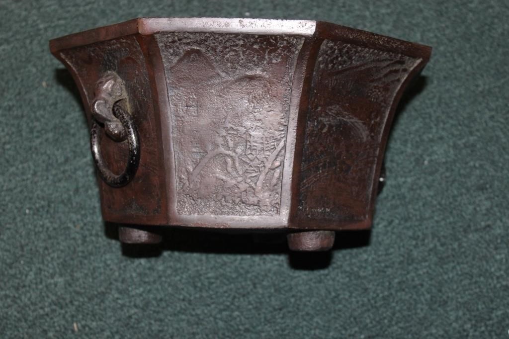 A Chinese Bronze or Cast Iron Plant Pot