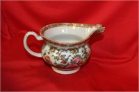 An Antique Chinese Rose Medallion Creamer