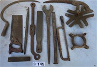 Assorted antique hand tools.