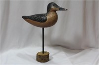 A Wooden Duck on Base