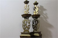 A Pair of Chinese Brass Candlesticks
