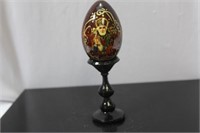 A Russian Lacquer Egg on Stand