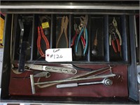 Lot of mixed tools in picture.