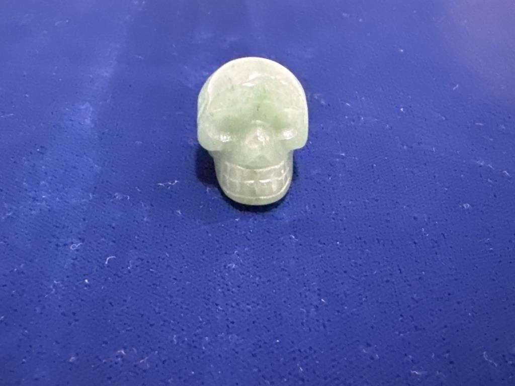 Crystal skull about 1 inch size green