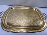 Large gold serving tray measures over 24” x 18”
