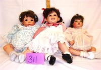 3 lg. porcelain dolls