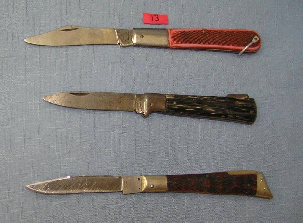 Group of oversized easy open pocket knives