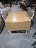 dining table with fold down sides and 2 chairs
