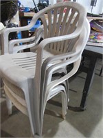 Four Plastic Lawn Chairs