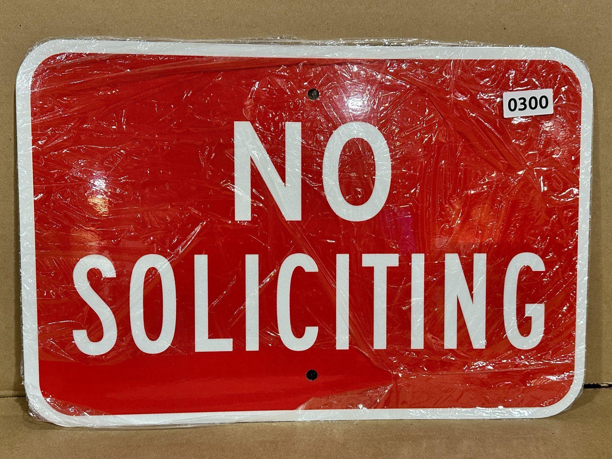 Large metal no soliciting sign