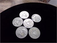 6-UN Peso coins