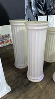 Two 40 “ plastic decorative columns