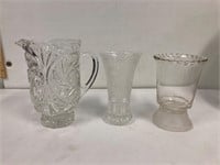 Glass pitcher and vases.