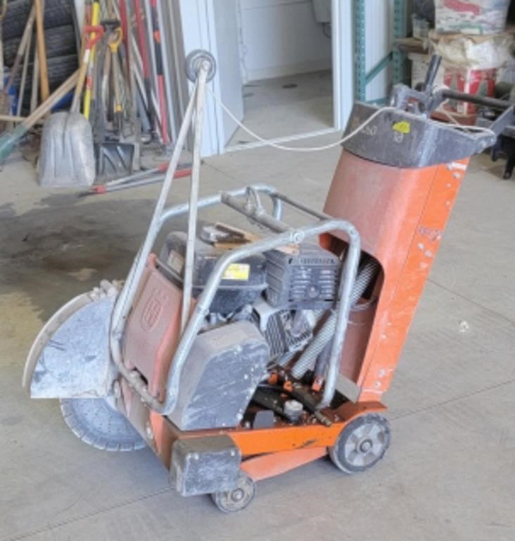 Husqvarna FS418 concrete saw. Runs and cuts as