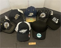 7 assorted sports hats