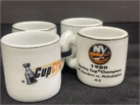 Four NHL Champions Collectible Mini Mugs.